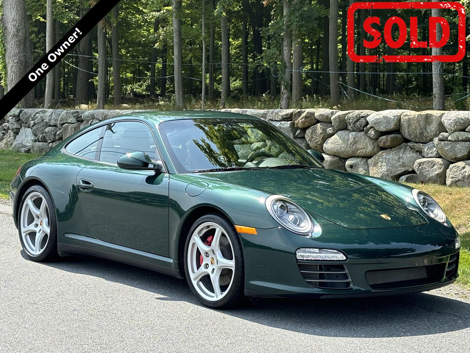 Porsche Racing Green Metallic 2011 Porsche 911 Coupe All-Wheel Drive 7-Speed Dual Clutch