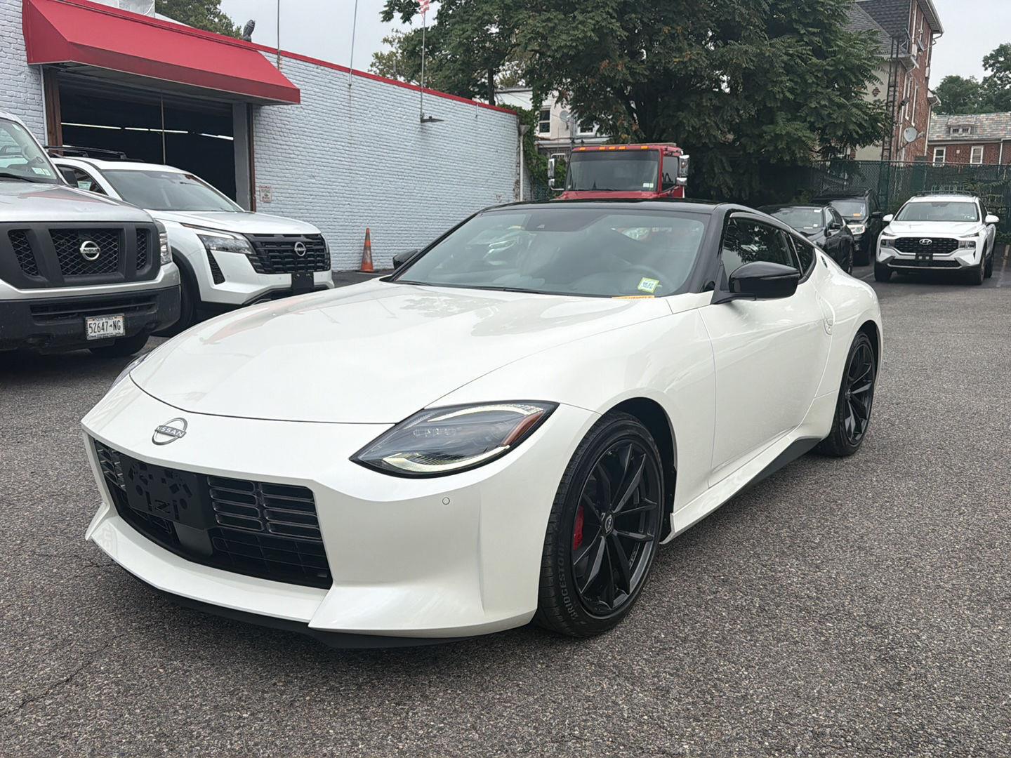 Pearl White Tricoat/Super Black 2025 Nissan Z Coupe Rear-Wheel Drive Manual