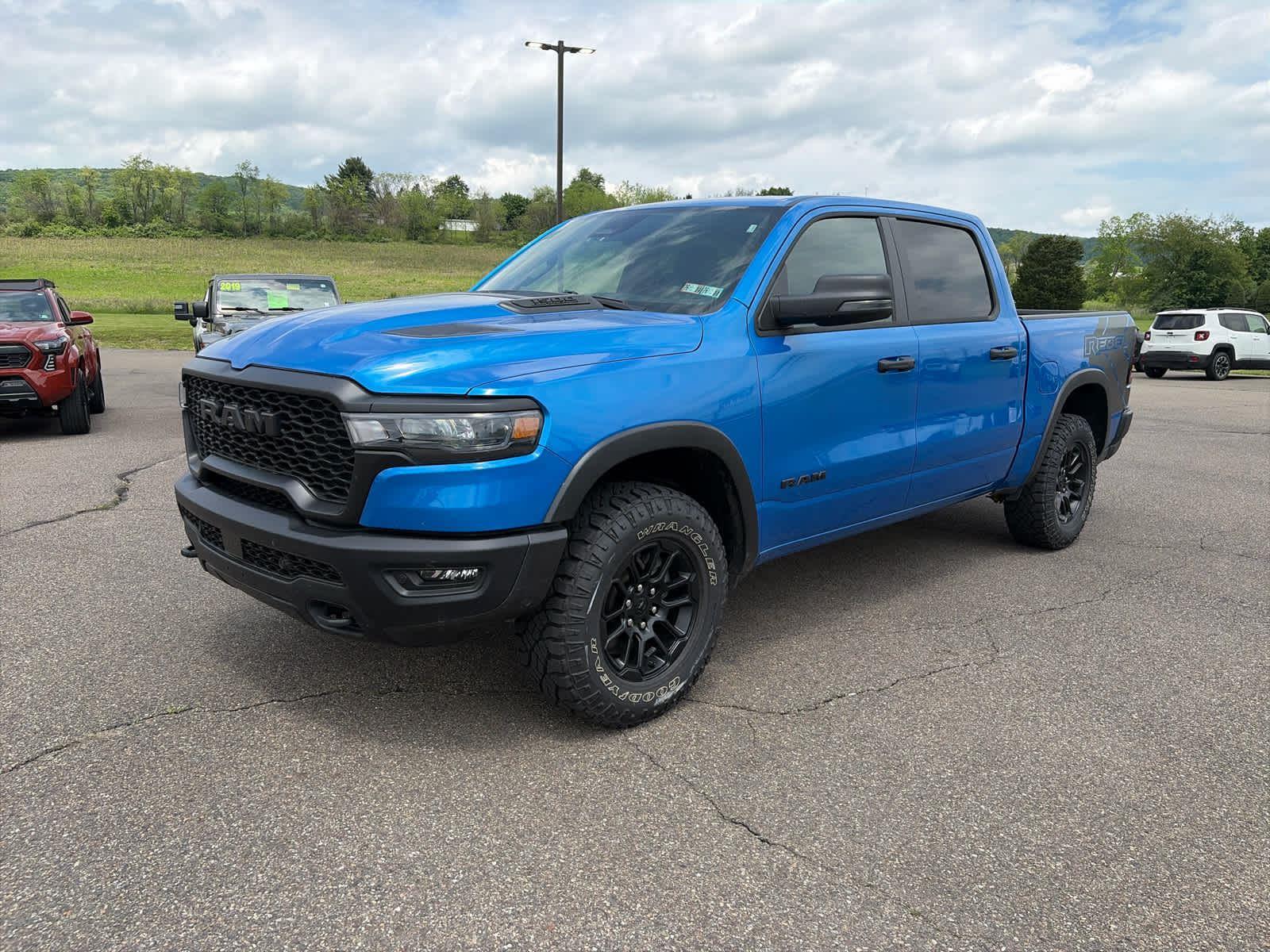 Hydro Blue Pearlcoat 2026 RAM 1500 Pickup Truck Four-Wheel Drive 8-Speed Automatic