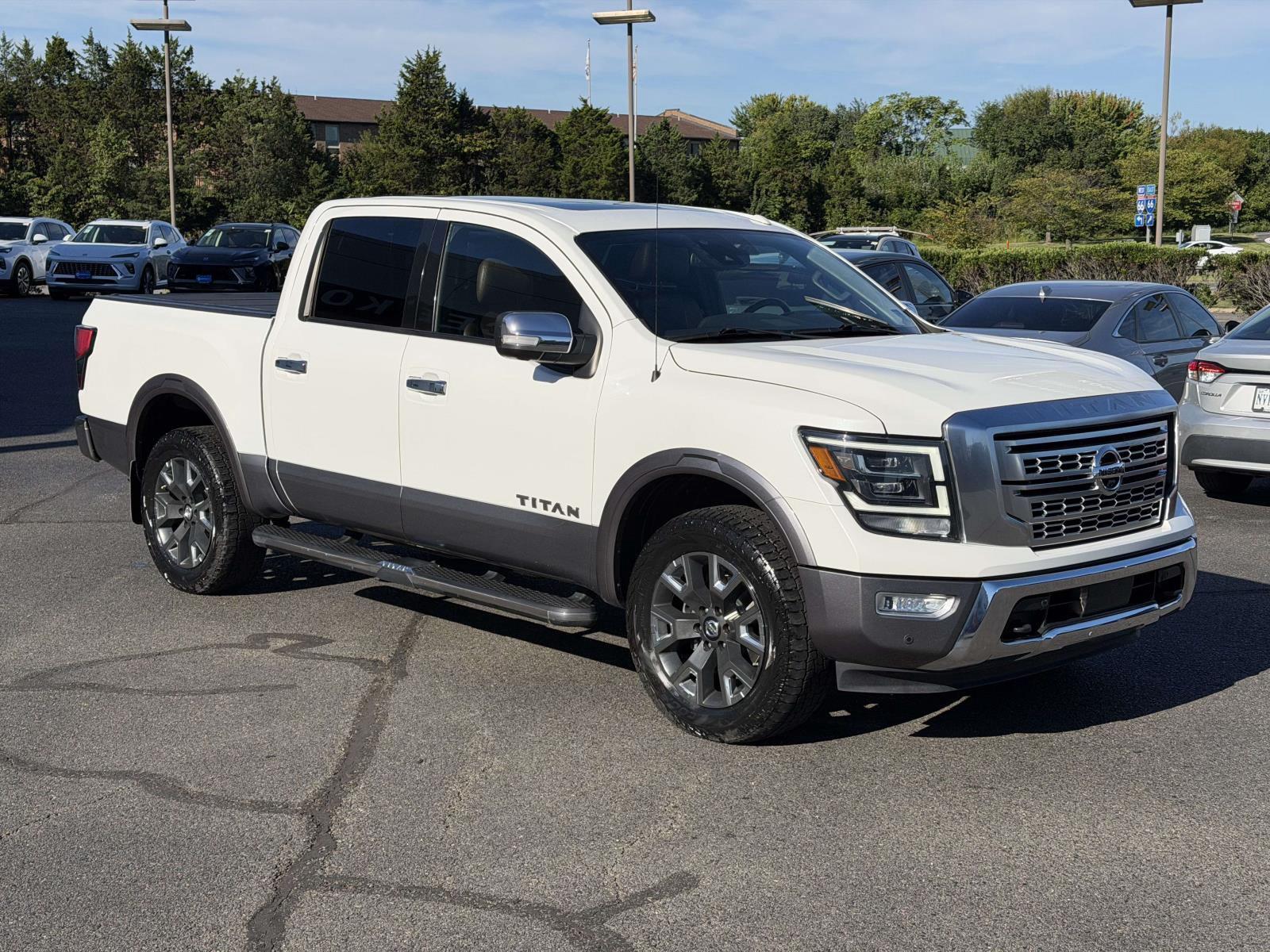 Pearl White 2021 Nissan Titan Pickup Truck Four-Wheel Drive Automatic
