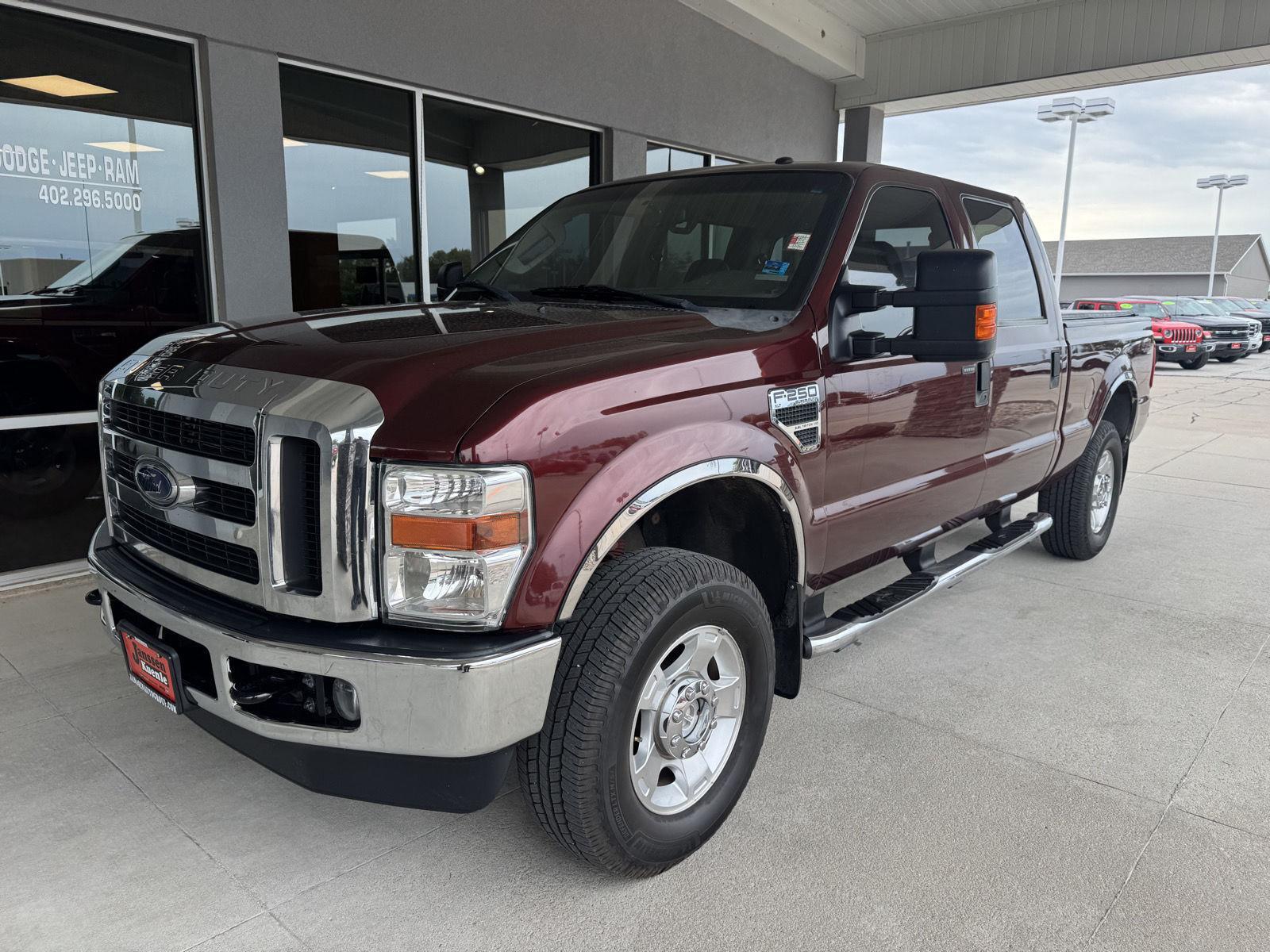 Royal Red Metallic 2010 Ford F-250 Super Duty Pickup Truck Four-Wheel Drive 6-Speed Manual Overdrive