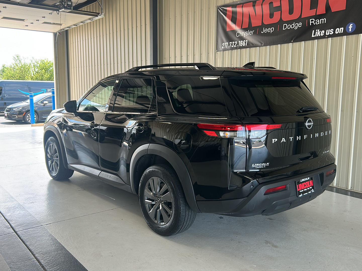 View vehicle photo 3