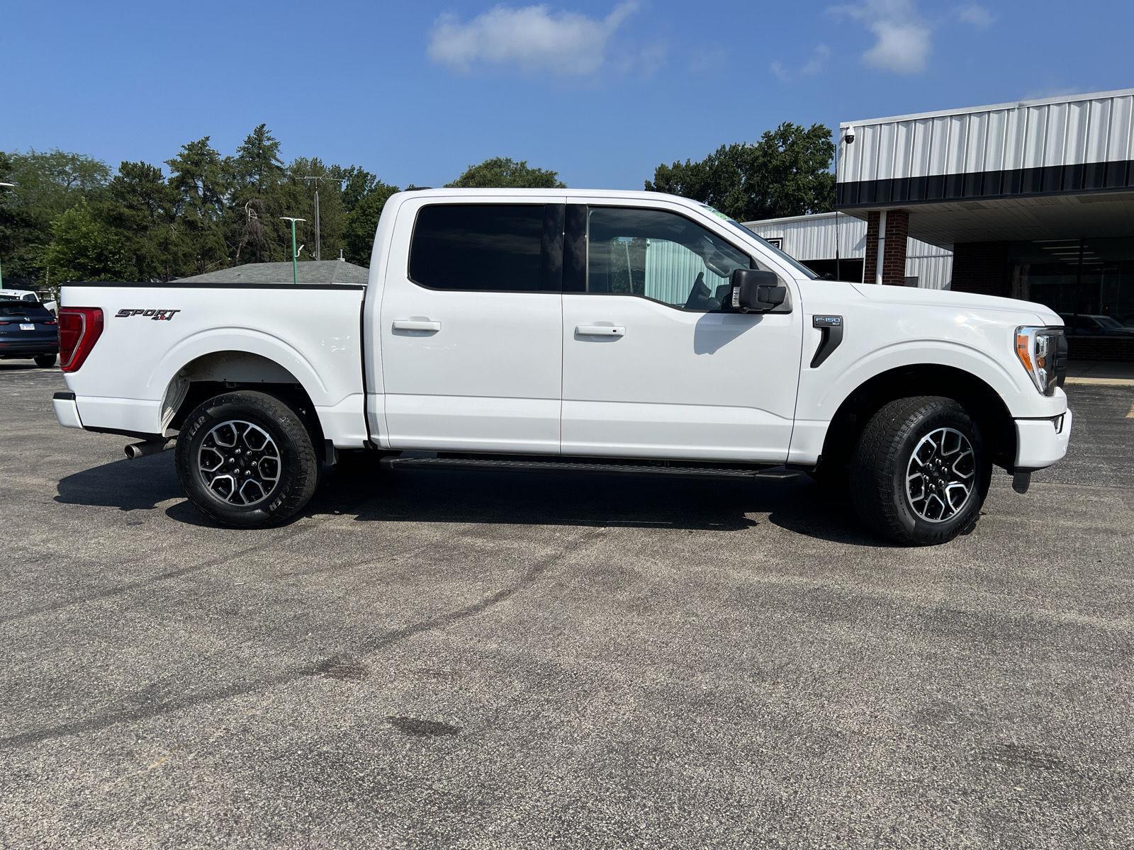 View vehicle photo 4
