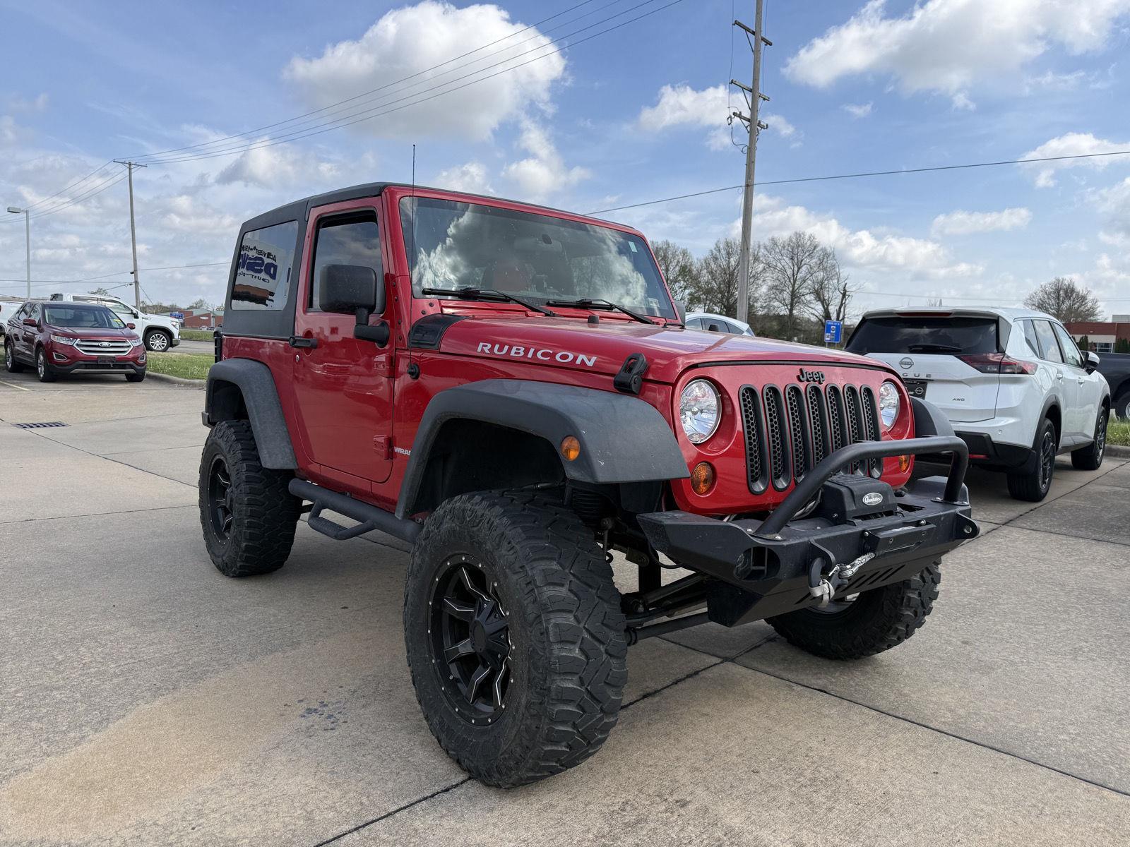 Flame Red Clearcoat 2012 Jeep Wrangler Rubicon 4WD SUV / Crossover Four-Wheel Drive 6-Speed Manual