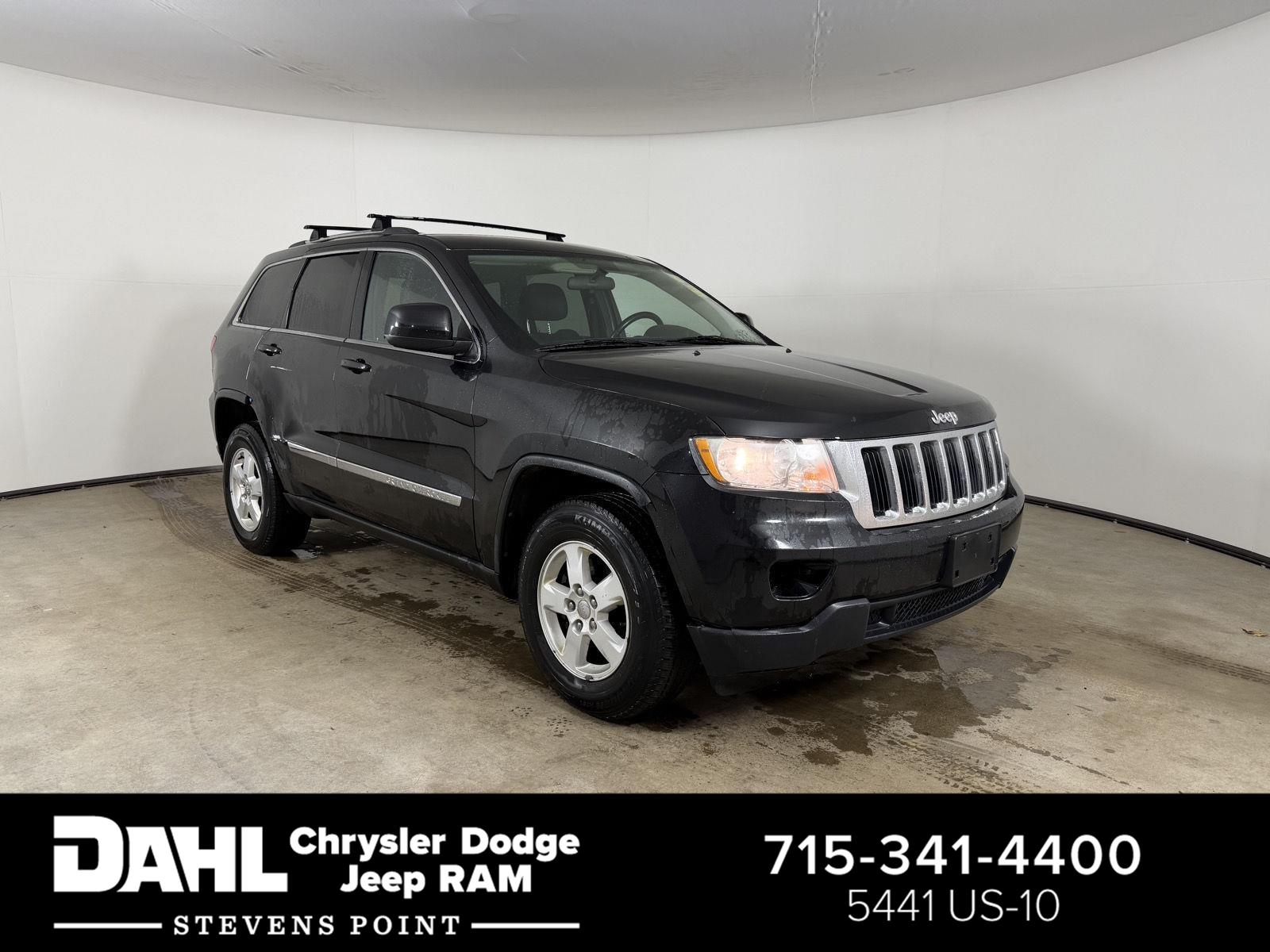 Brilliant Black Crystal Pearl 2012 Jeep Grand Cherokee Laredo 4WD SUV / Crossover Four-Wheel Drive 5-Speed Automatic