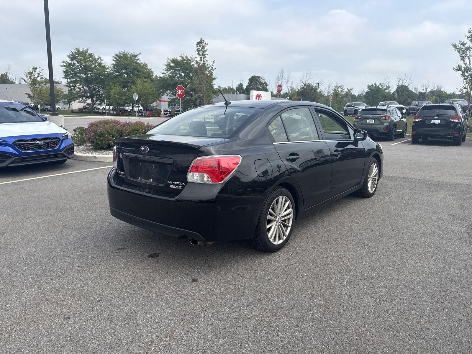Used 2015 Crystal Black Silica Subaru Premium image 4