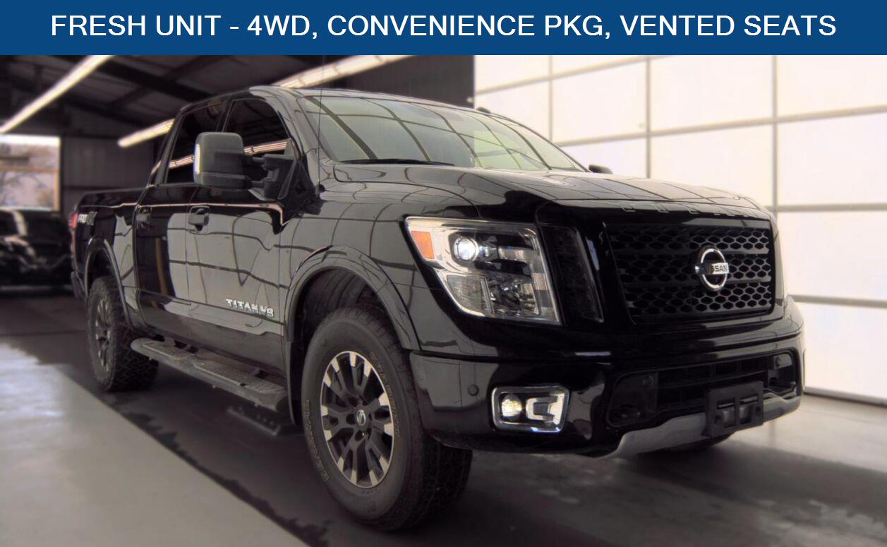 Gray (Magnetic Black Metallic) 2019 Nissan Titan Pickup Truck Four-Wheel Drive 7-Speed Automatic