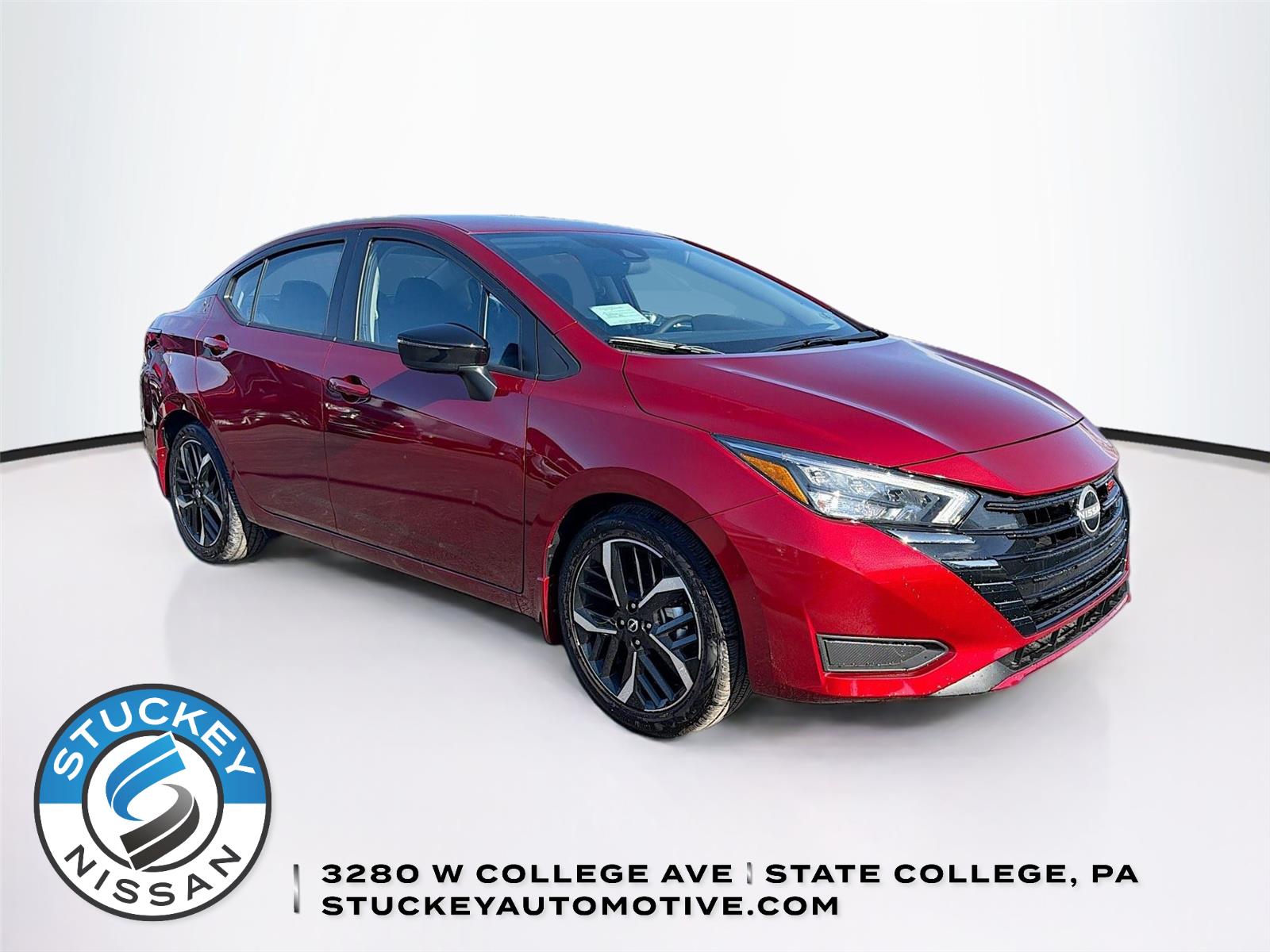 Red (Scarlet Ember Tintcoat) 2025 Nissan Versa SR FWD Sedan Front-Wheel Drive Continuously Variable Transmission