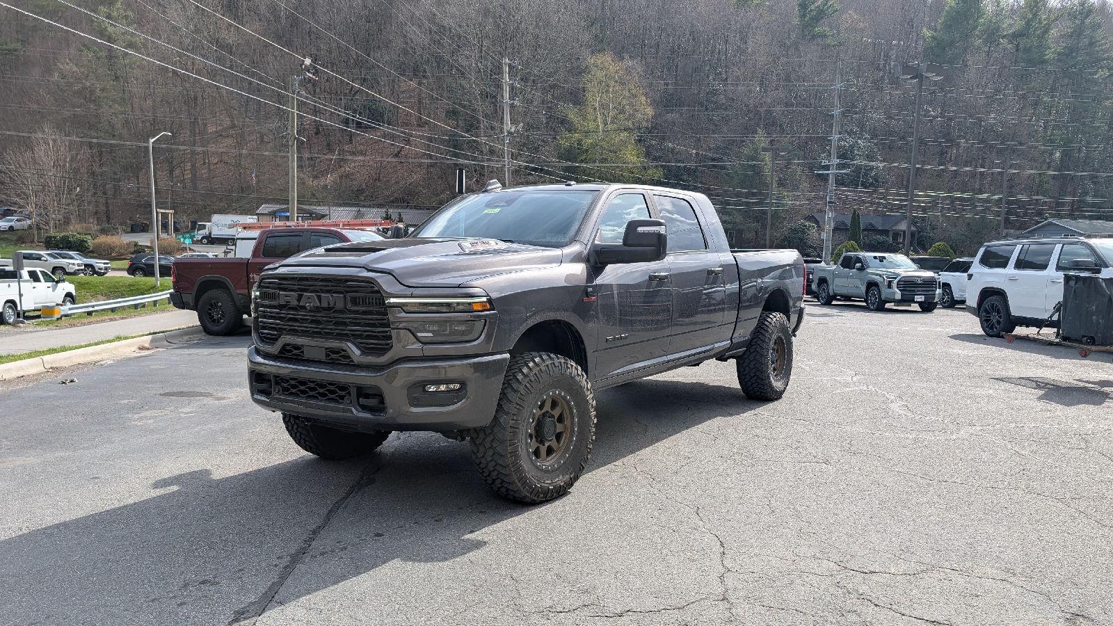 Gray (Granite Crystal Metallic Clearcoat) 2025 RAM 3500 Laramie Mega Cab 4WD Pickup Truck Four-Wheel Drive 8-Speed Automatic