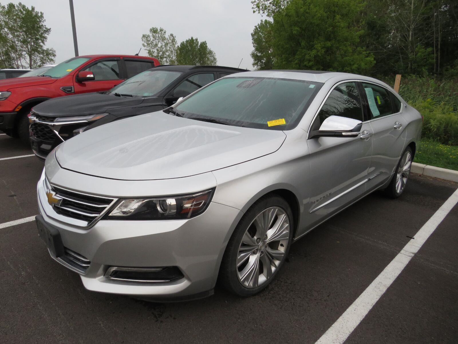 Used 2014 Silver Ice Metallic Chevrolet LTZ image 4