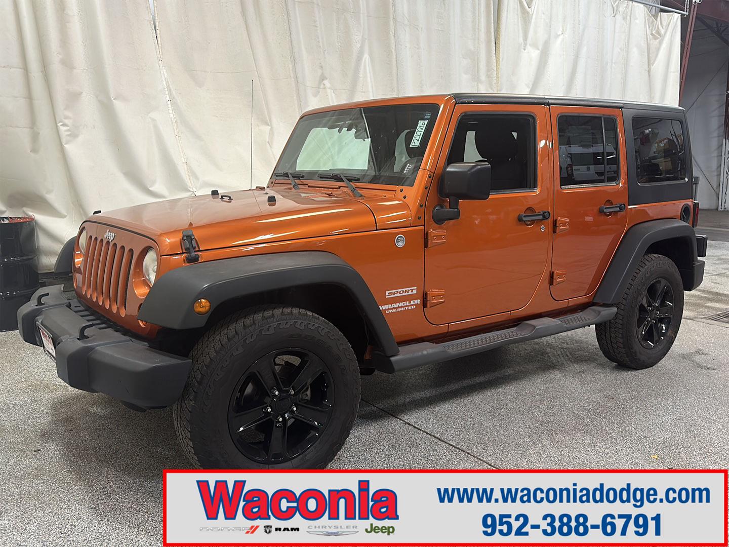 Orange (Mango Tango Pearl) 2011 Jeep Wrangler SUV / Crossover Four-Wheel Drive 6-Speed Manual