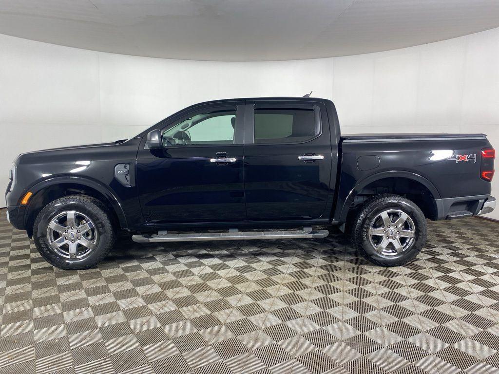 View vehicle photo 4