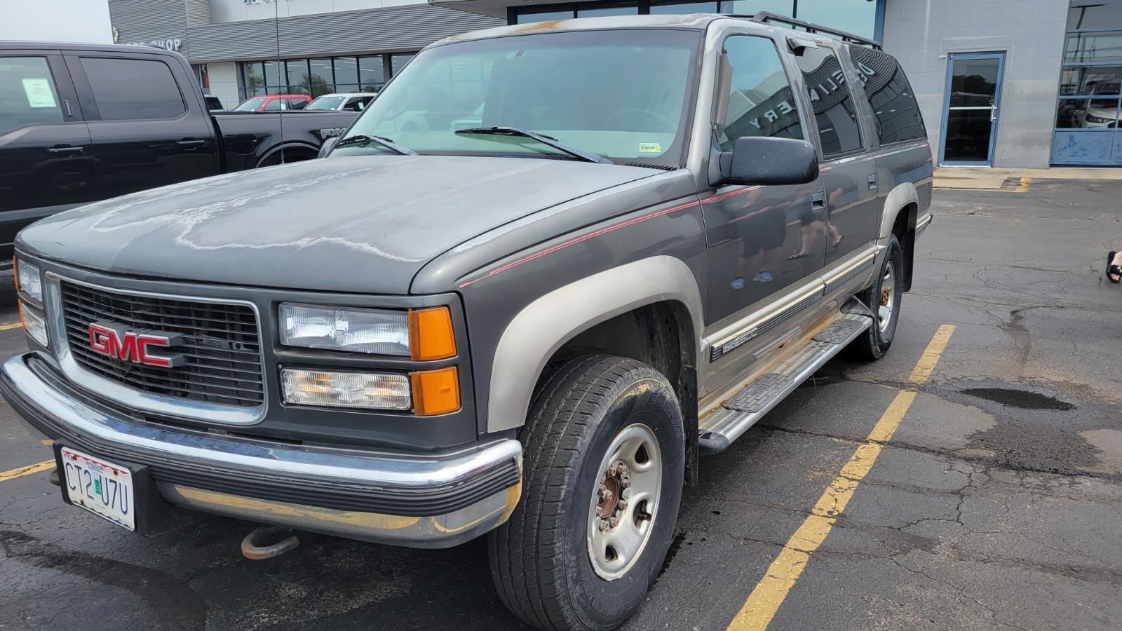 Certified 1999 GMC Suburban SL with VIN 1GKGK26J3XJ719420 for sale in Kansas City