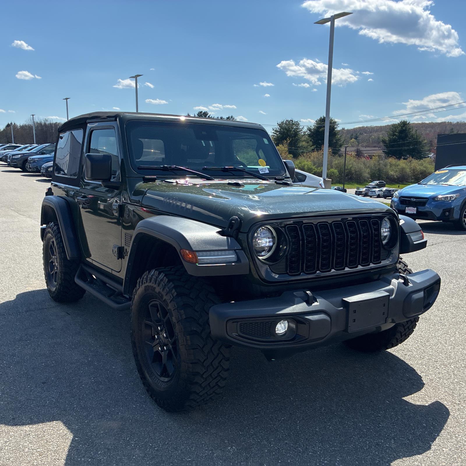 View vehicle photo 2