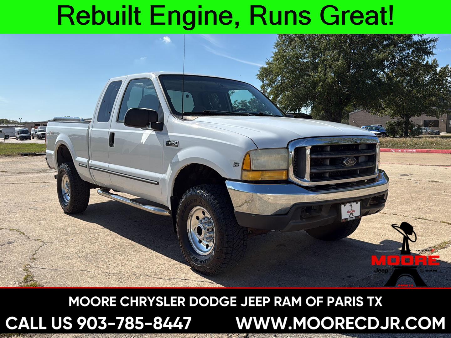 White 1999 Ford F-250 Super Duty Pickup Truck Four-Wheel Drive