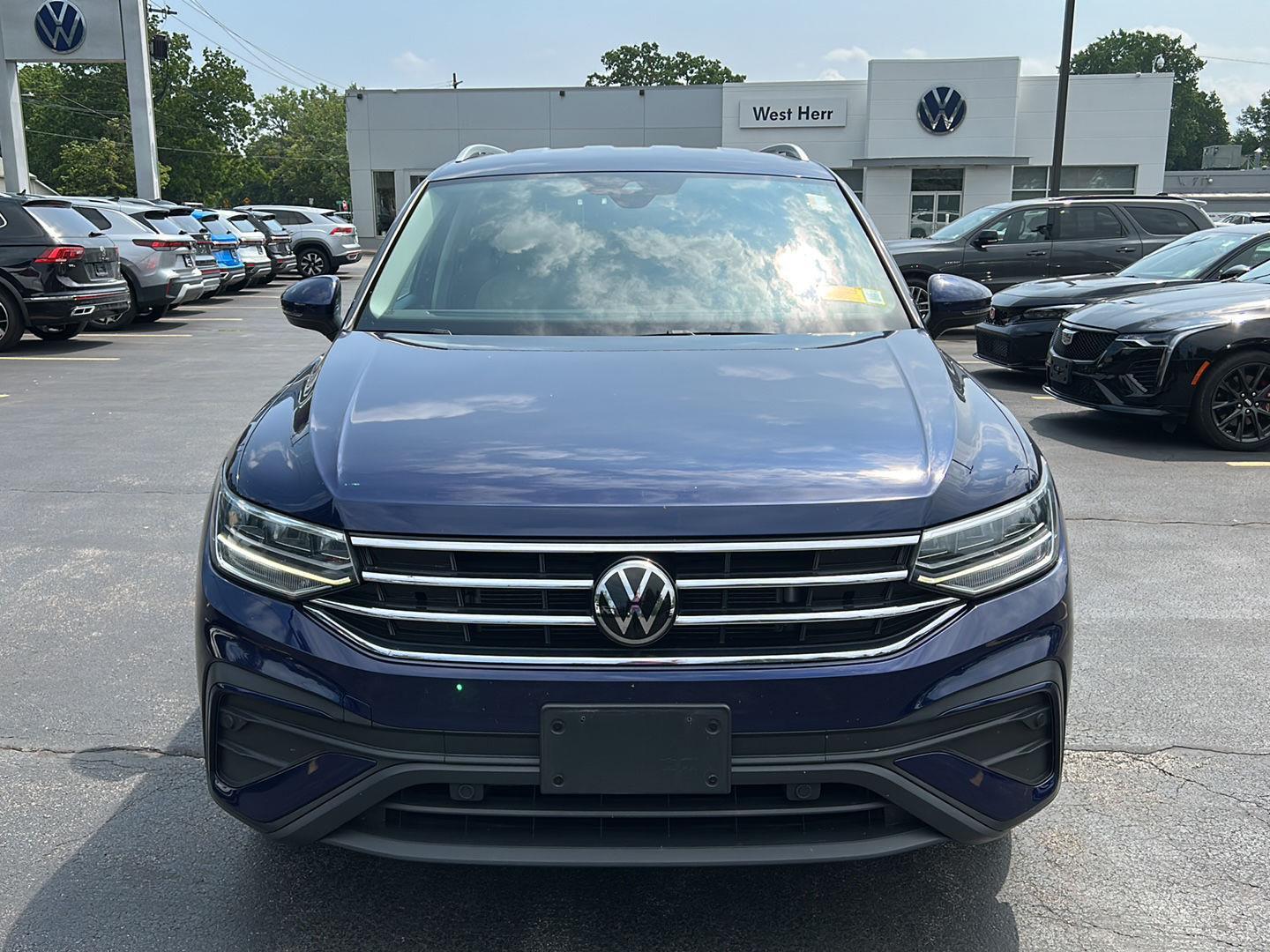 Used 2022 Atlantic Blue Metallic Volkswagen SE image 2