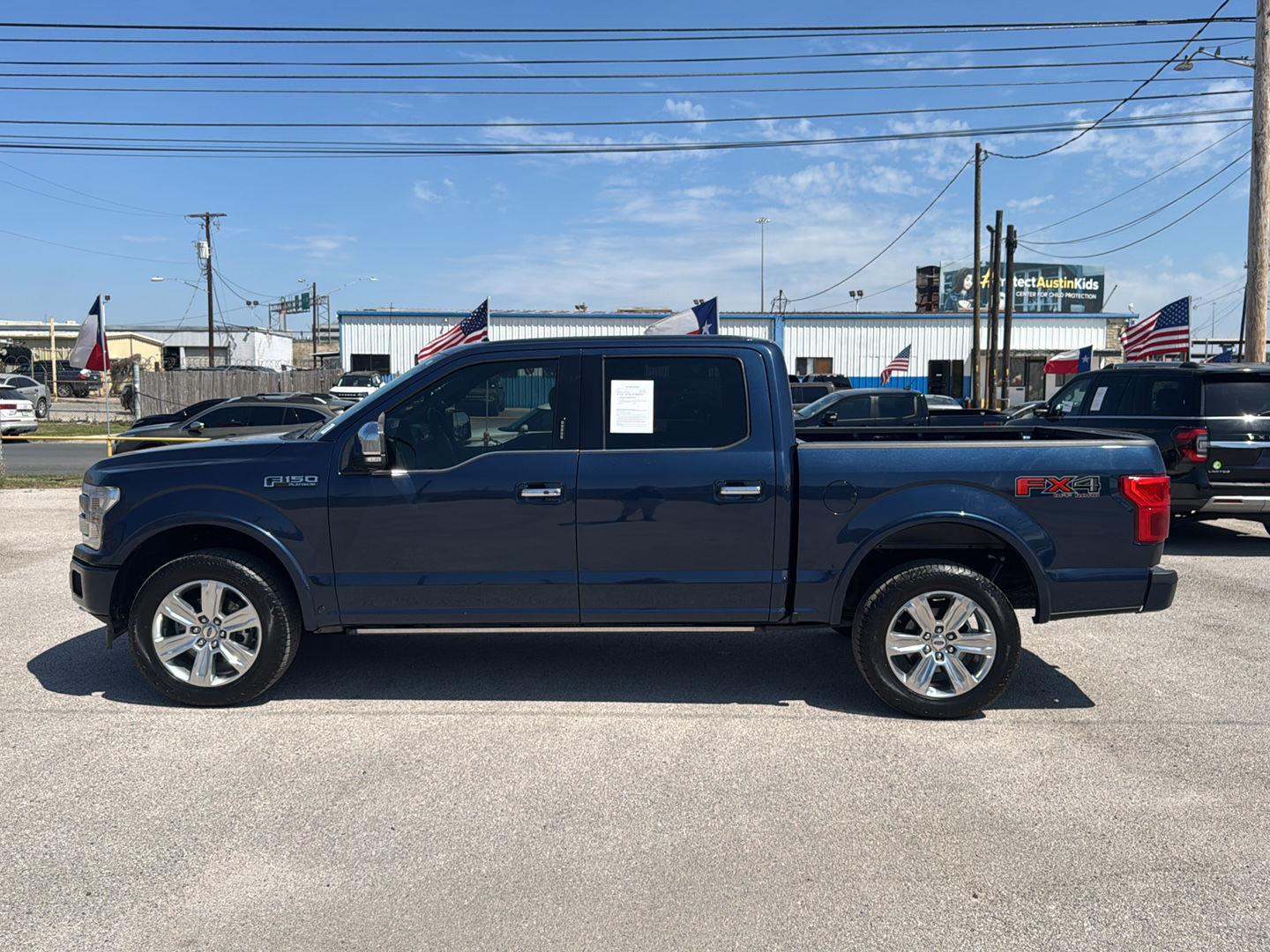 View vehicle photo 4