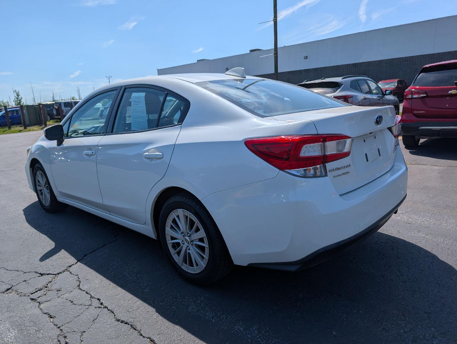Used 2017 Crystal White Pearl Subaru Premium image 5
