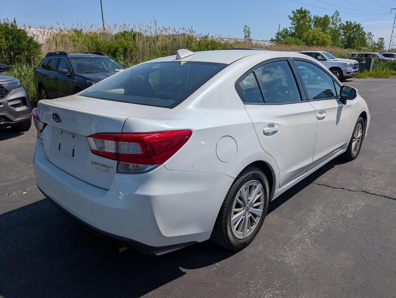 Used 2017 Crystal White Pearl Subaru Premium image 7