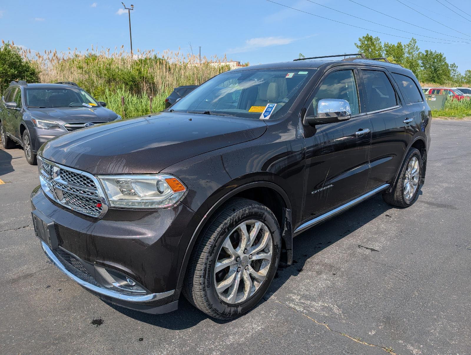 Used 2016 Luxury Brown Pearlcoat Dodge Citadel image 4