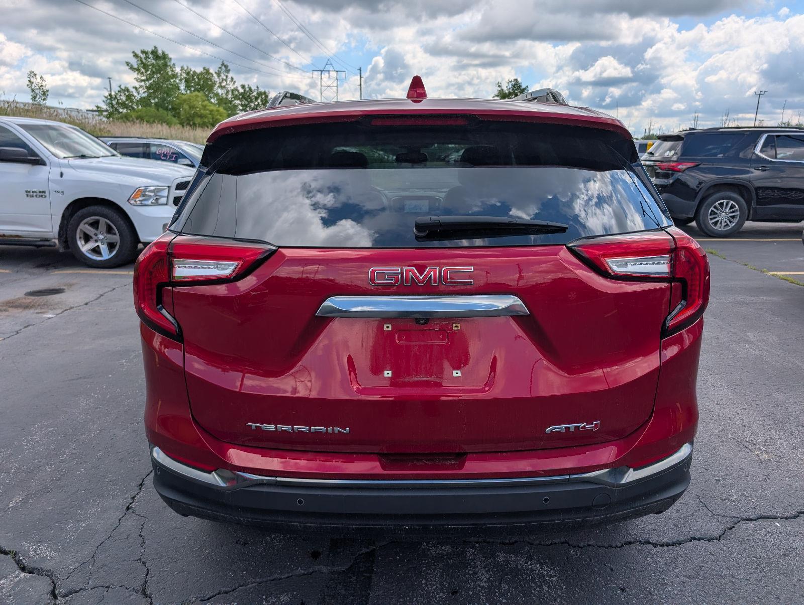 Used 2024 Volcanic Red Tintcoat GMC AT4 image 8