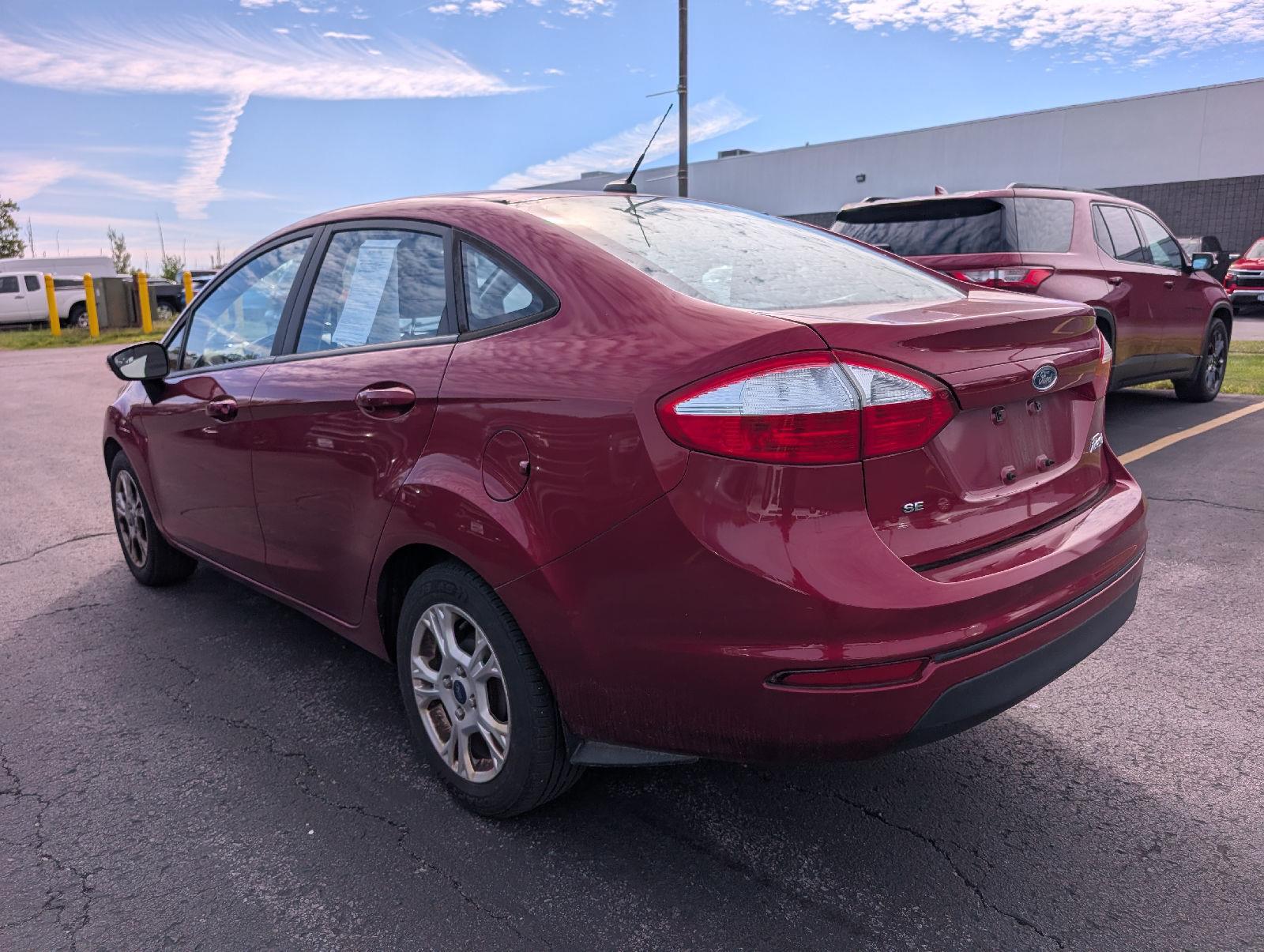 Used 2016 Ruby Red Metallic Tinted Clearcoat Ford SE image 5
