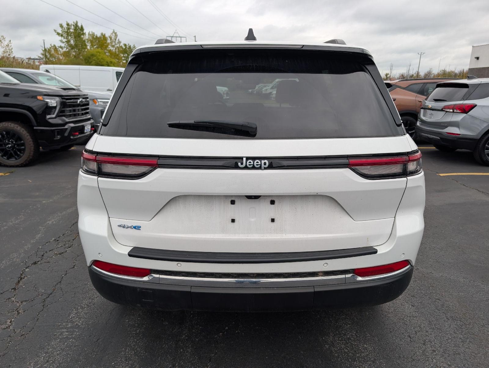 Used 2024 Bright White Clearcoat Jeep 4xe image 6