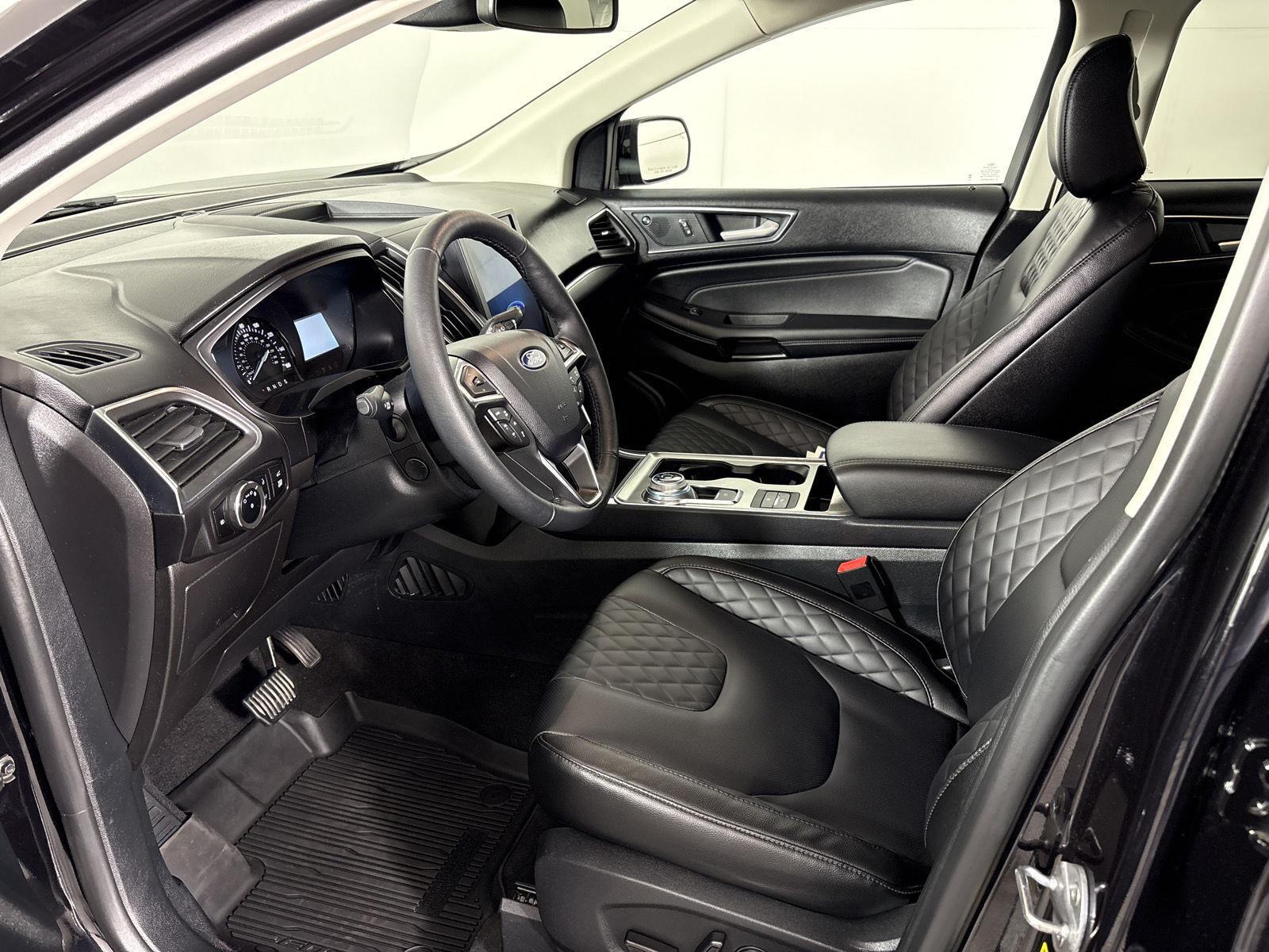 Used 2024 Agate Black Metallic Ford Titanium image 5