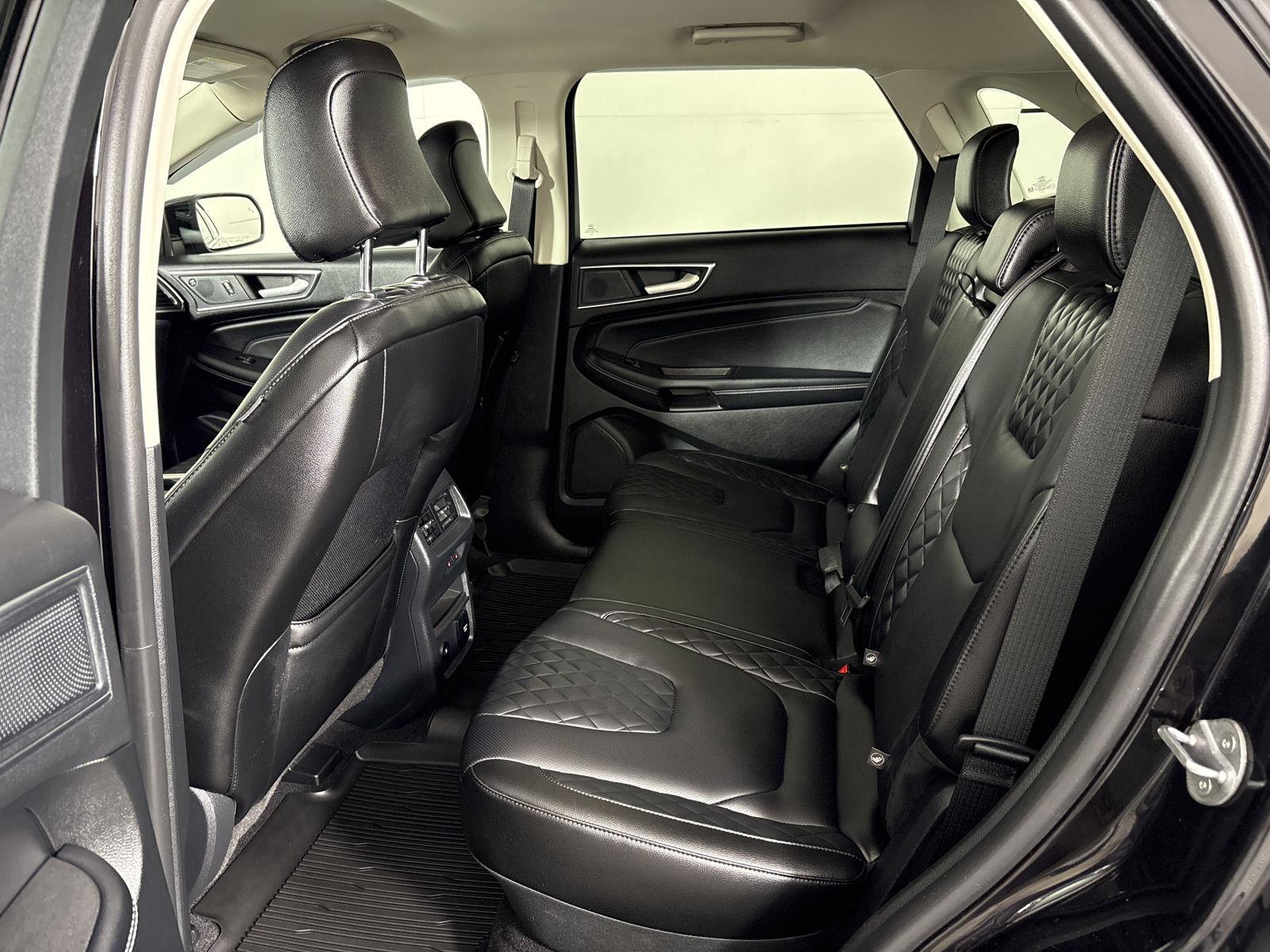 Used 2024 Agate Black Metallic Ford Titanium image 13