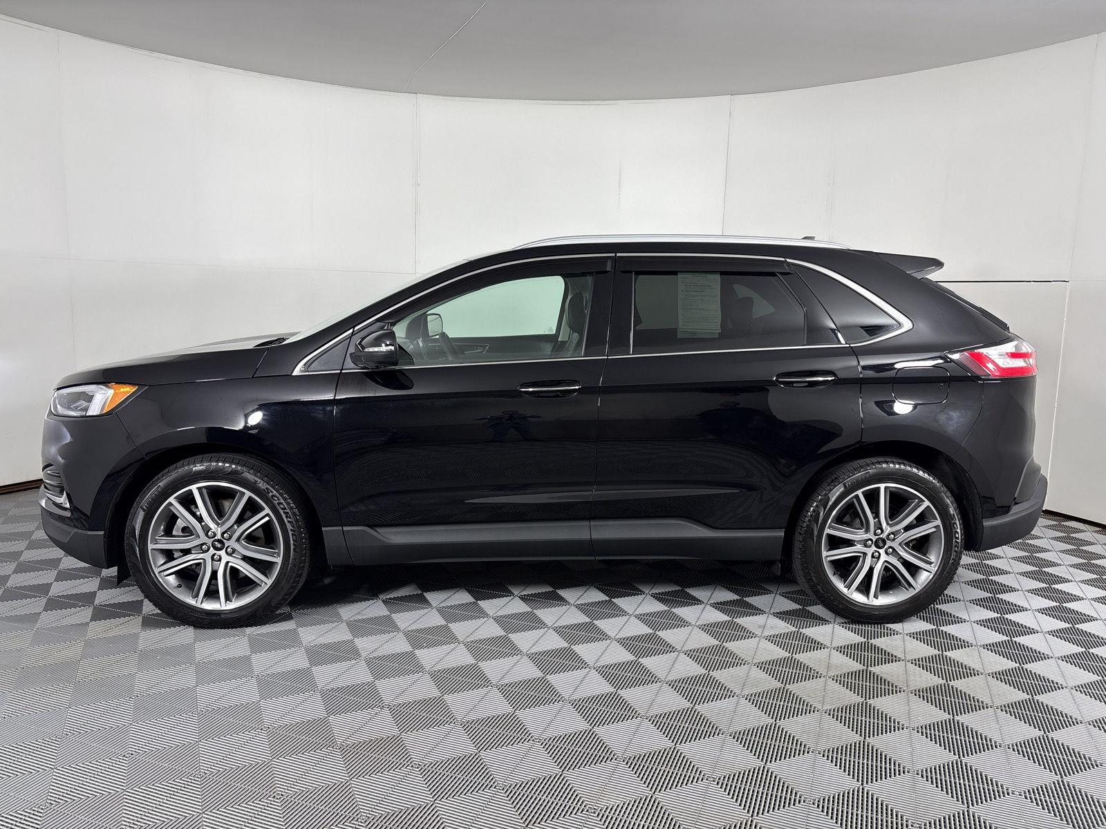 Used 2024 Agate Black Metallic Ford Titanium image 16