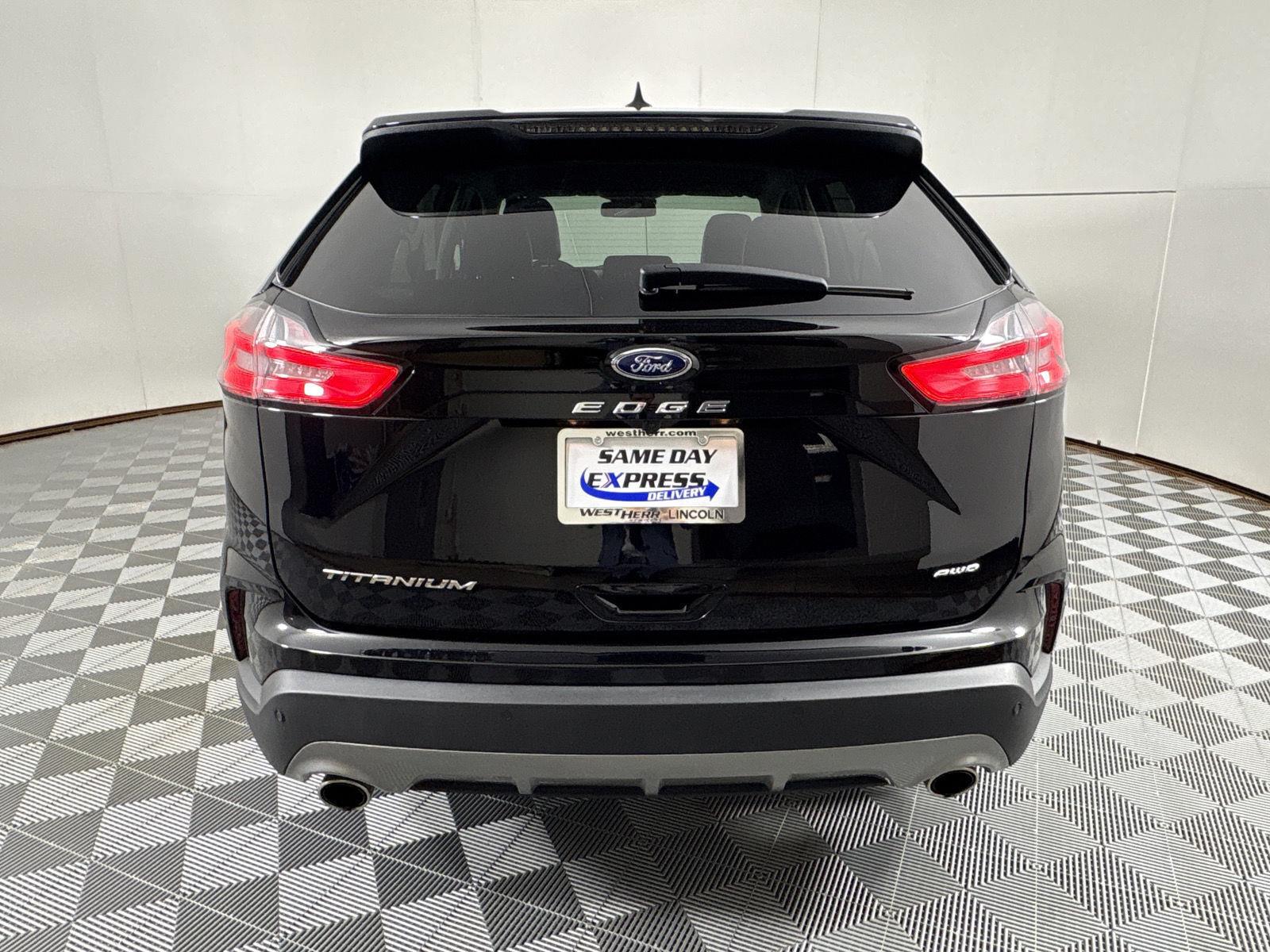Used 2024 Agate Black Metallic Ford Titanium image 18