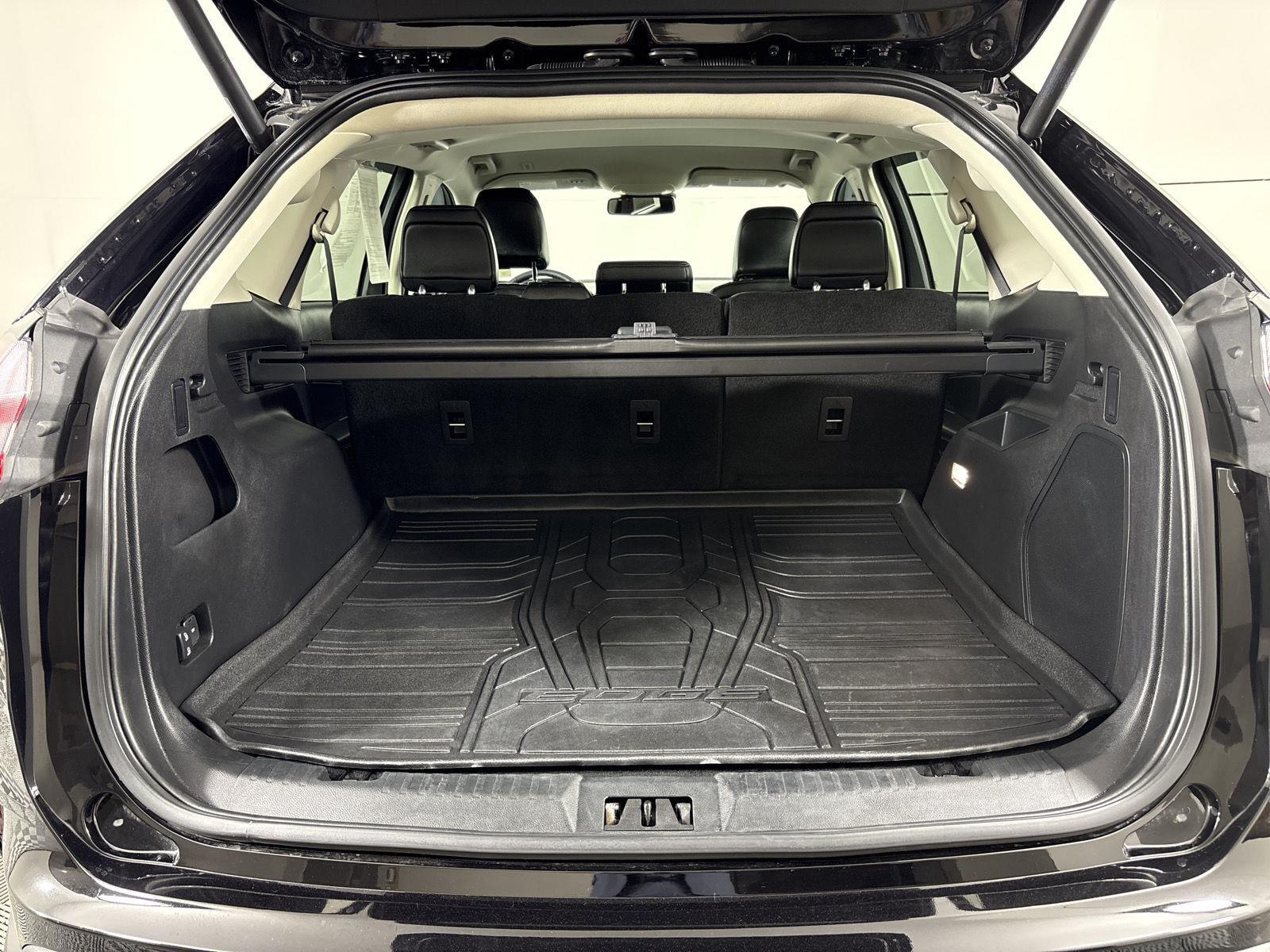 Used 2024 Agate Black Metallic Ford Titanium image 19
