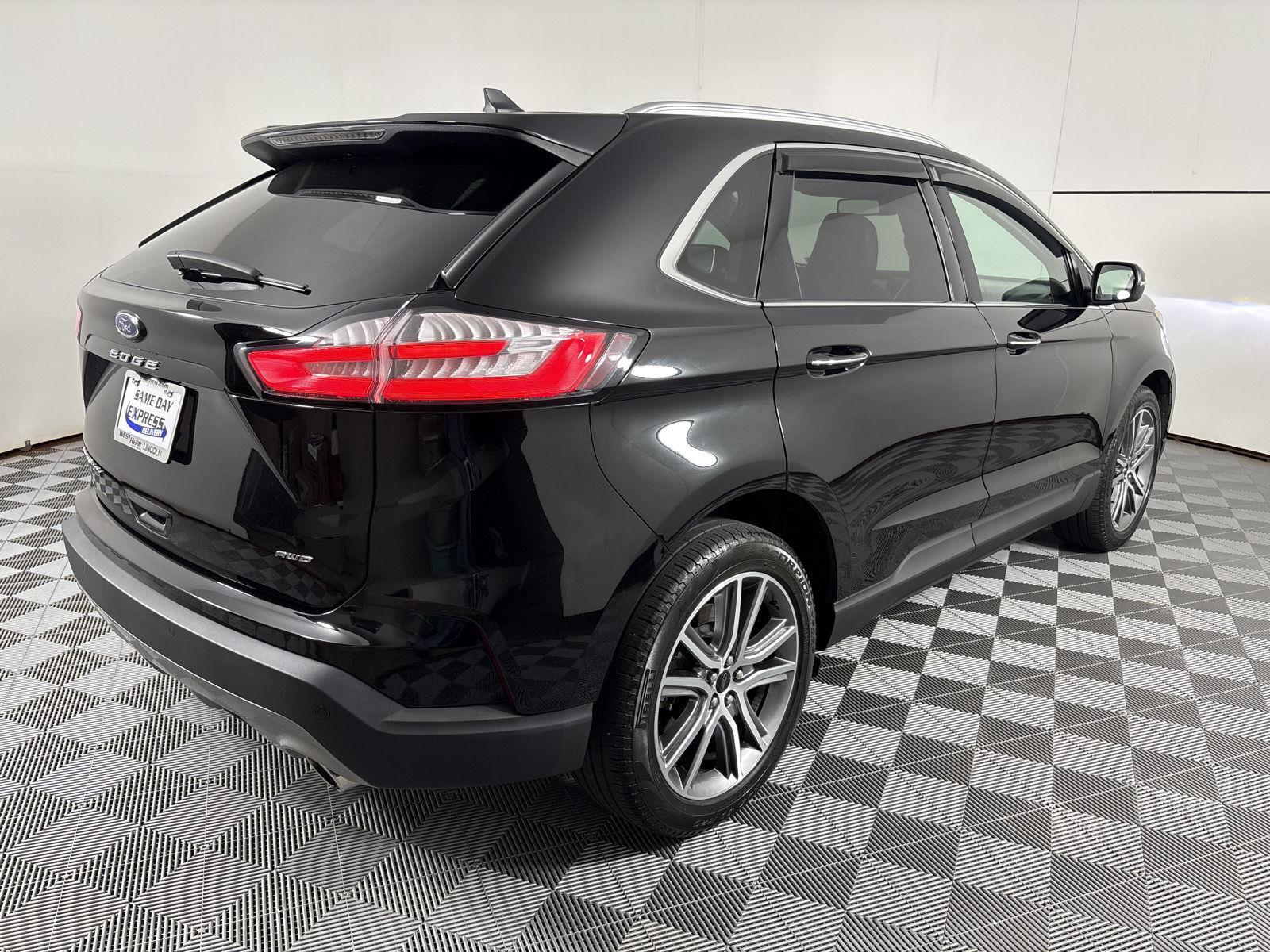 Used 2024 Agate Black Metallic Ford Titanium image 22