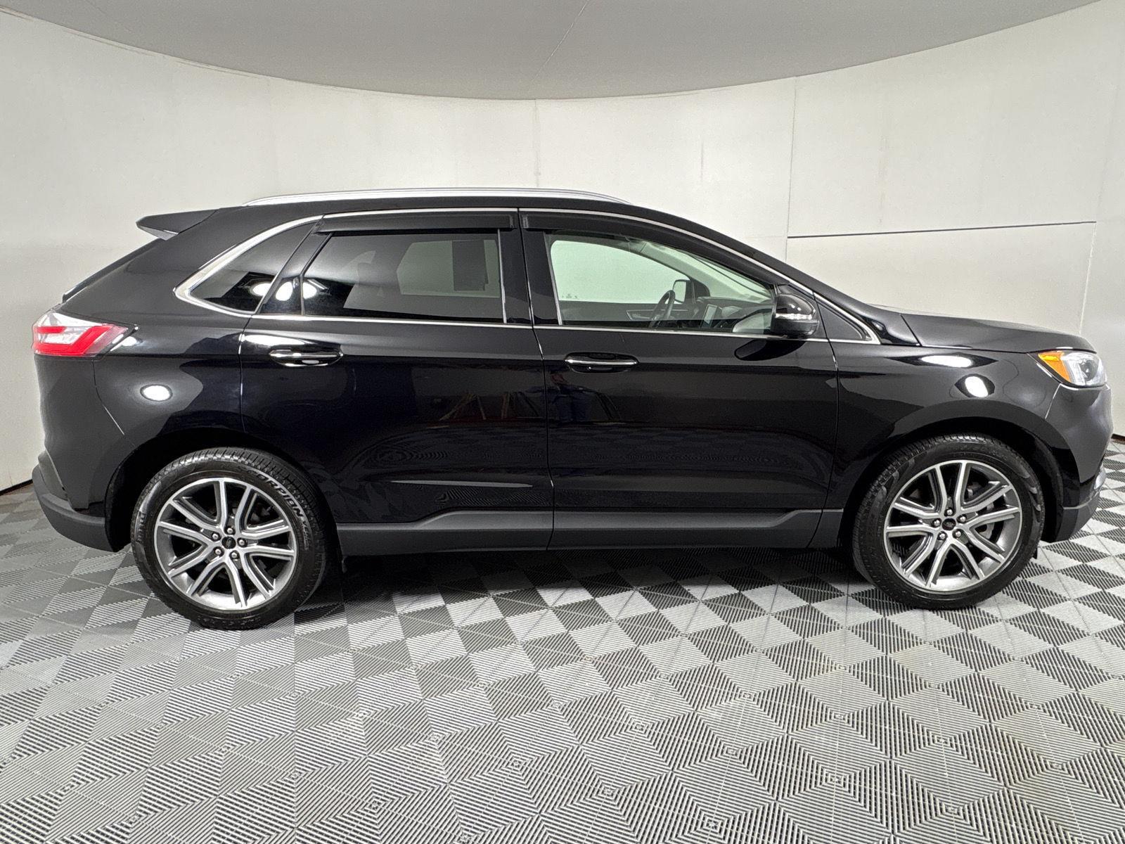 Used 2024 Agate Black Metallic Ford Titanium image 23