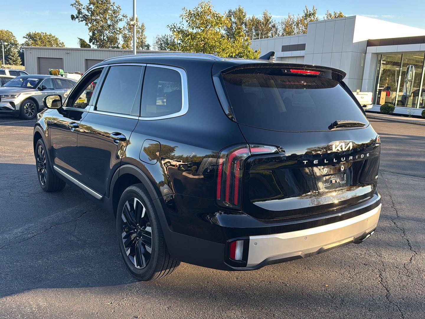 Used 2024 Ebony Black Kia SX-Prestige image 3