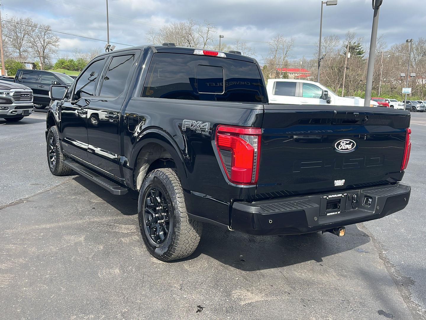 View vehicle photo 3