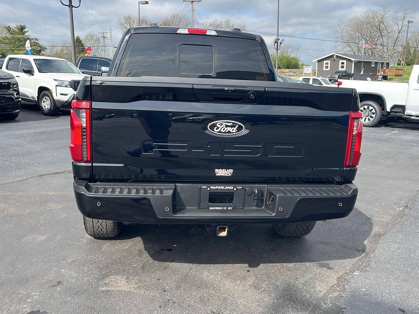 View vehicle photo 4