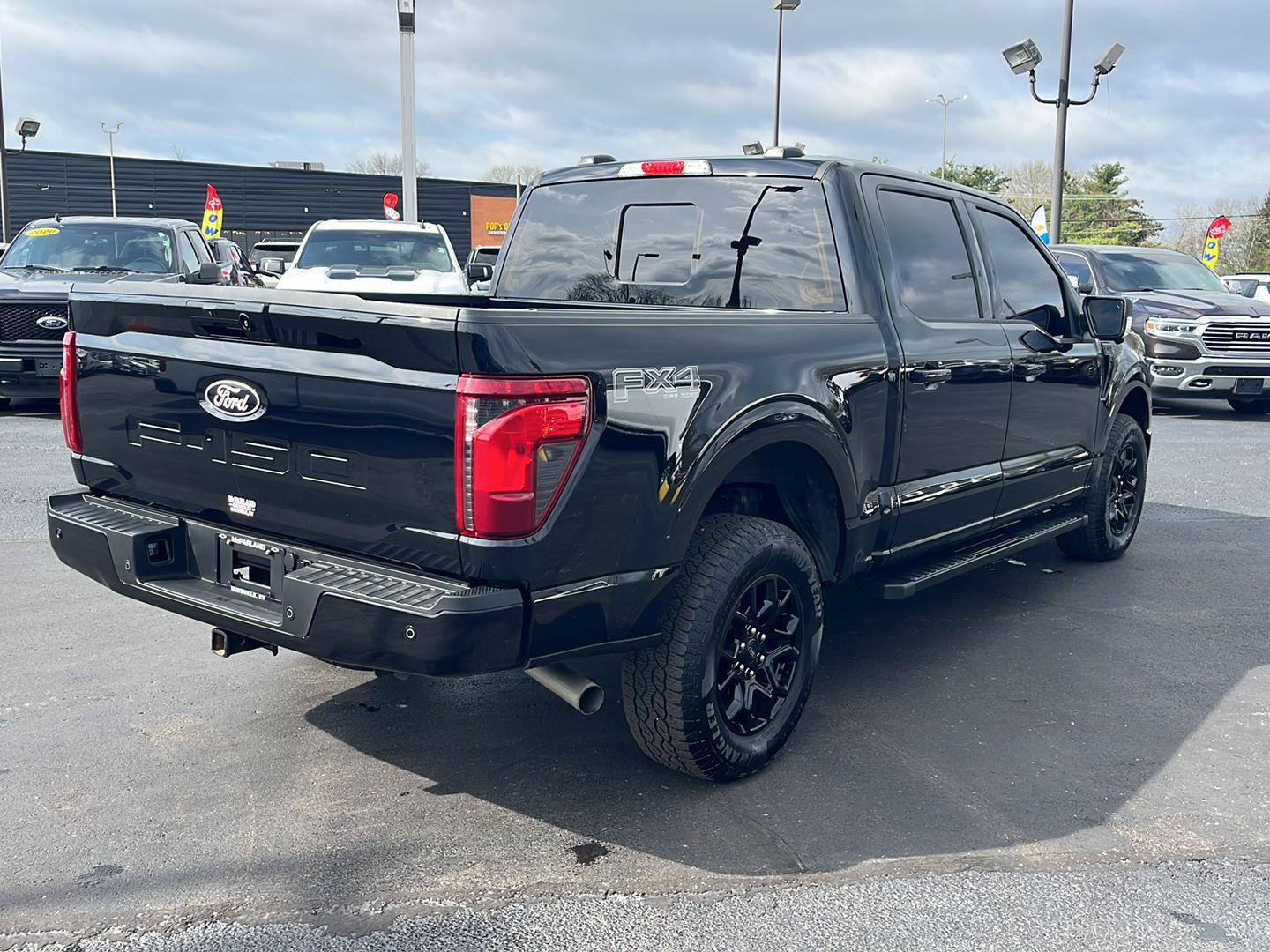 View vehicle photo 5