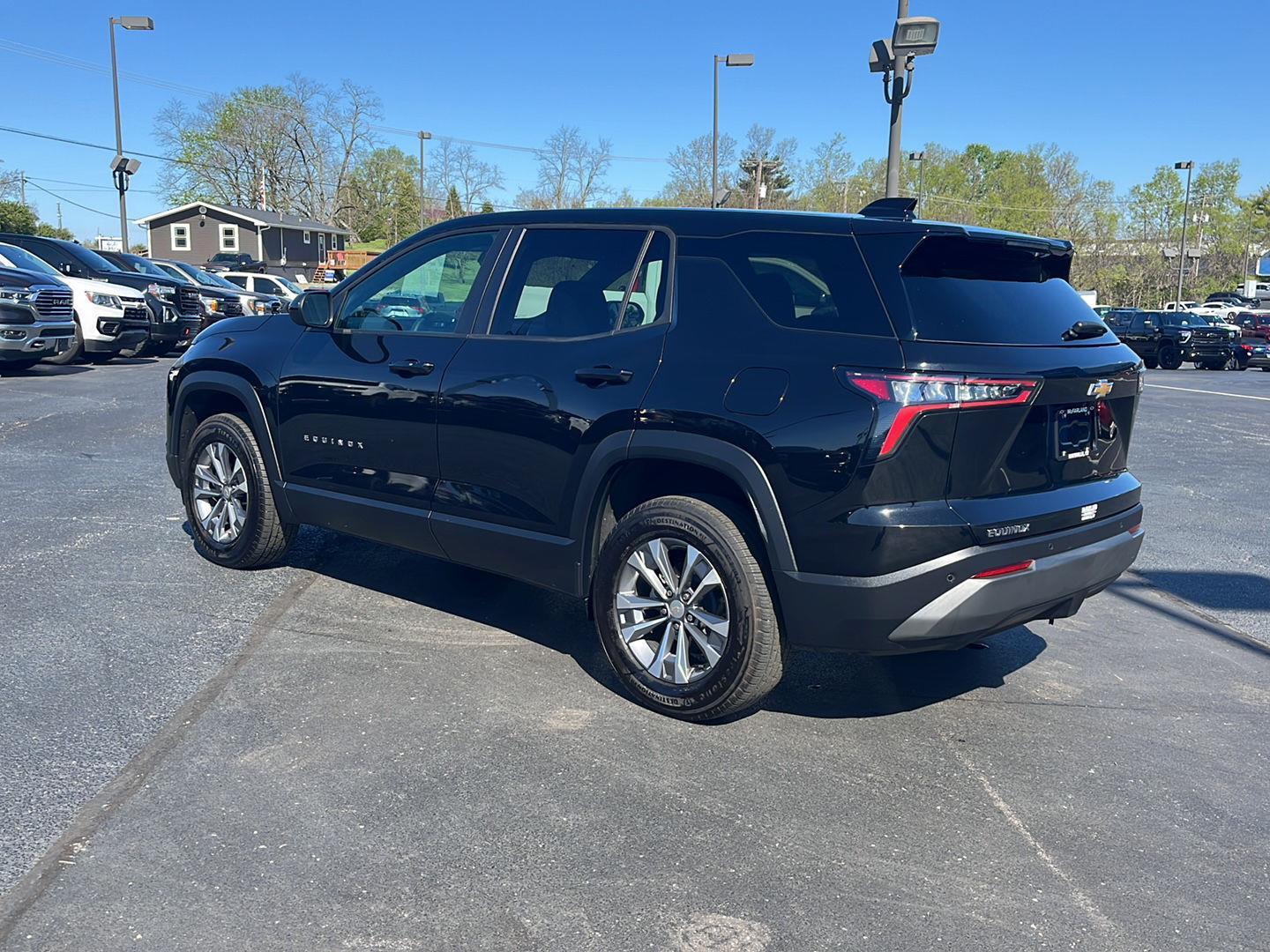 View vehicle photo 3