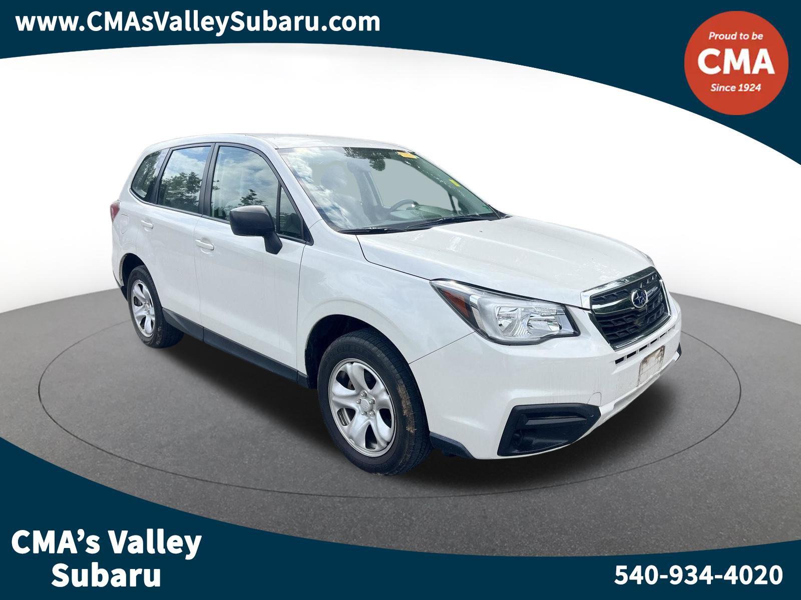 Crystal White Pearl 2018 Subaru Forester SUV / Crossover All-Wheel Drive Manual