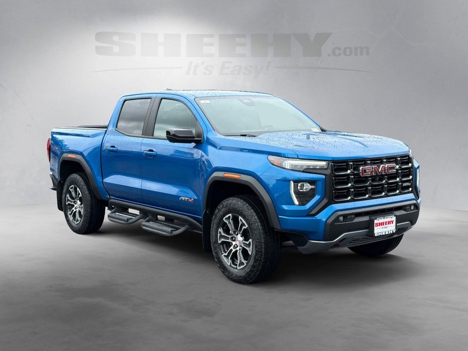 Used 2024 Dynamic Blue Metallic GMC 4WD AT4 image 2