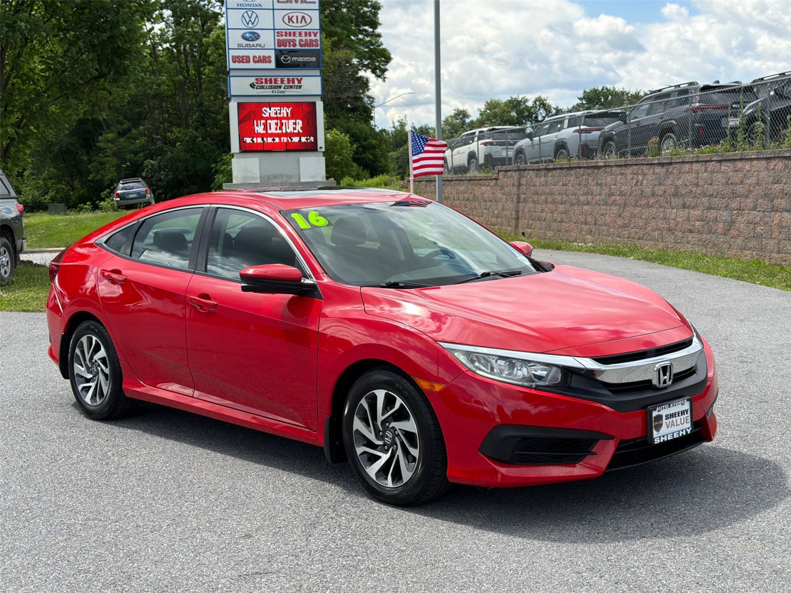 Rallye Red 2016 Honda Civic Sedan Front-Wheel Drive Continuously Variable Transmission