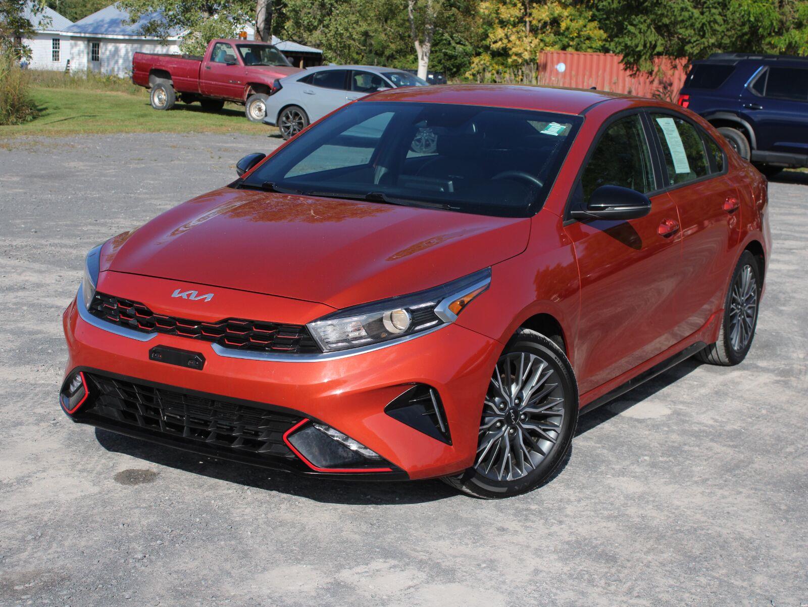 Fire Orange 2023 Kia Forte Sedan Front-Wheel Drive Continuously Variable Transmission