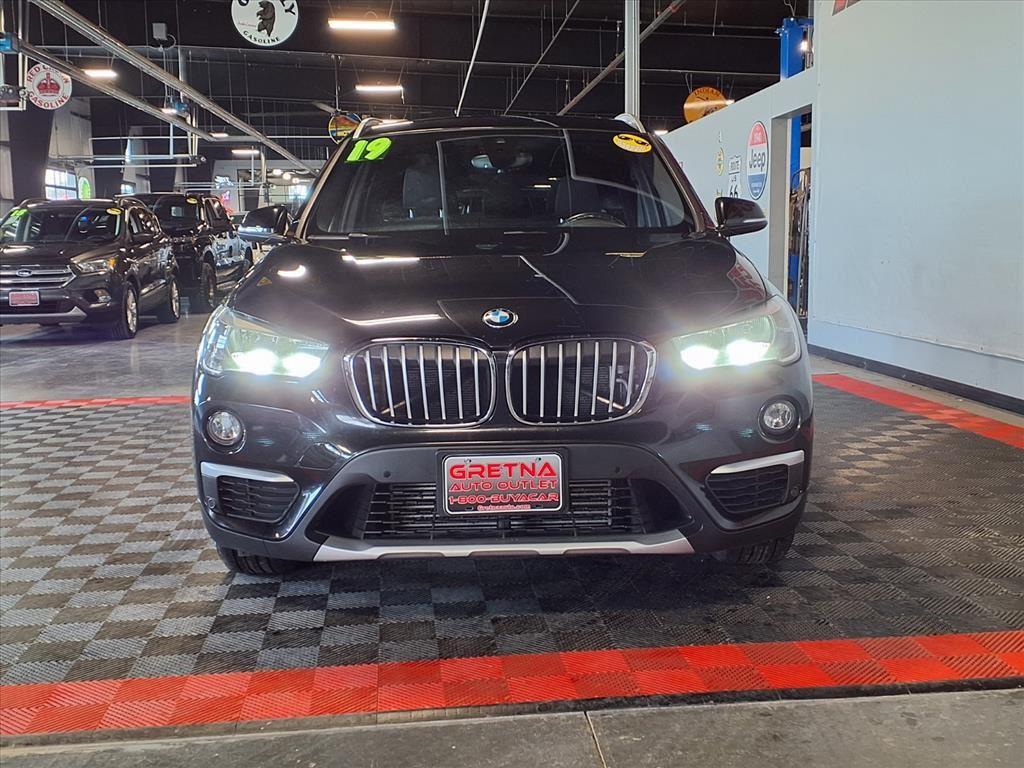 2019 BMW X1 xDrive28i - Black Sapphire Metallic exterior view 2