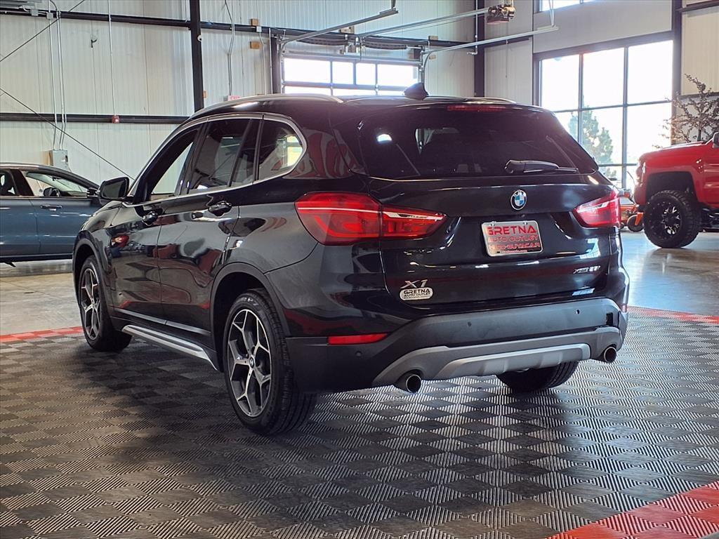 2019 BMW X1 xDrive28i - Black Sapphire Metallic exterior view 4