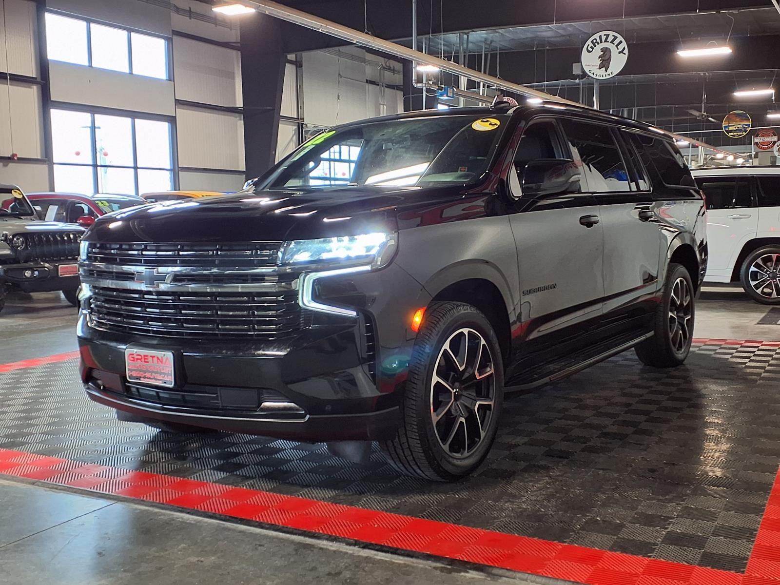 2022 Chevrolet Suburban RST - Black exterior view 3