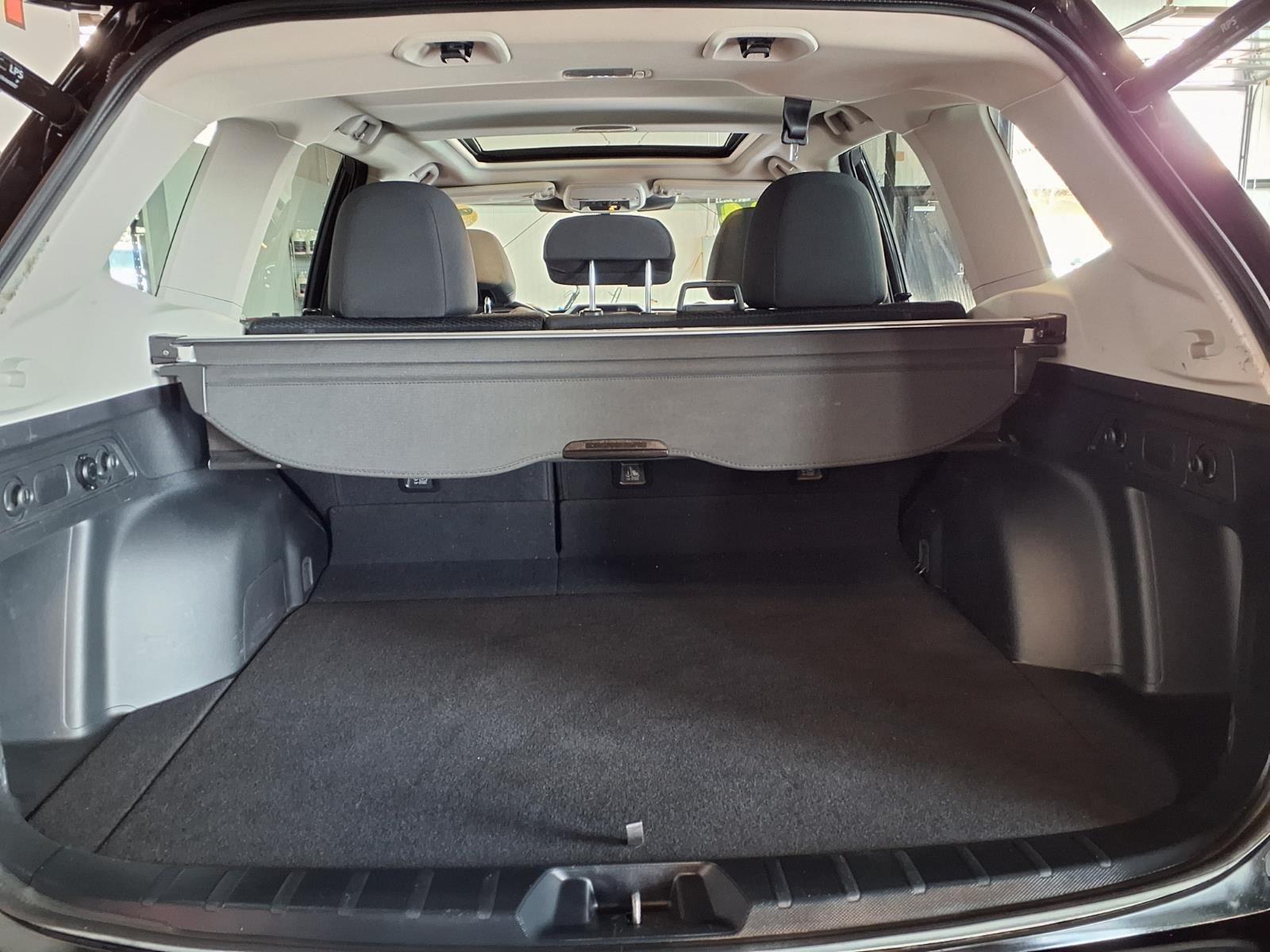 2024 Subaru Forester Premium - Crystal Black Silica exterior view 6