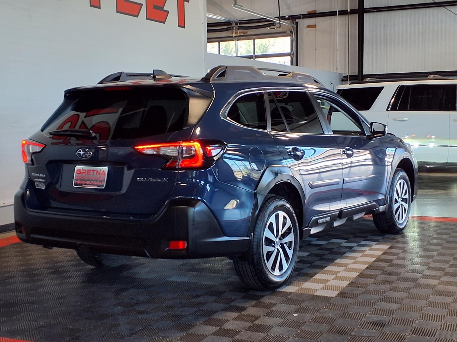 2024 Subaru Outback Premium - Cosmic Blue Pearl exterior view 8