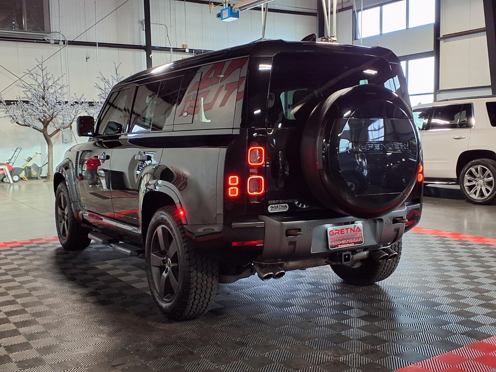 2023 Land Rover Defender V8 - Santorini Black Metallic exterior view 4