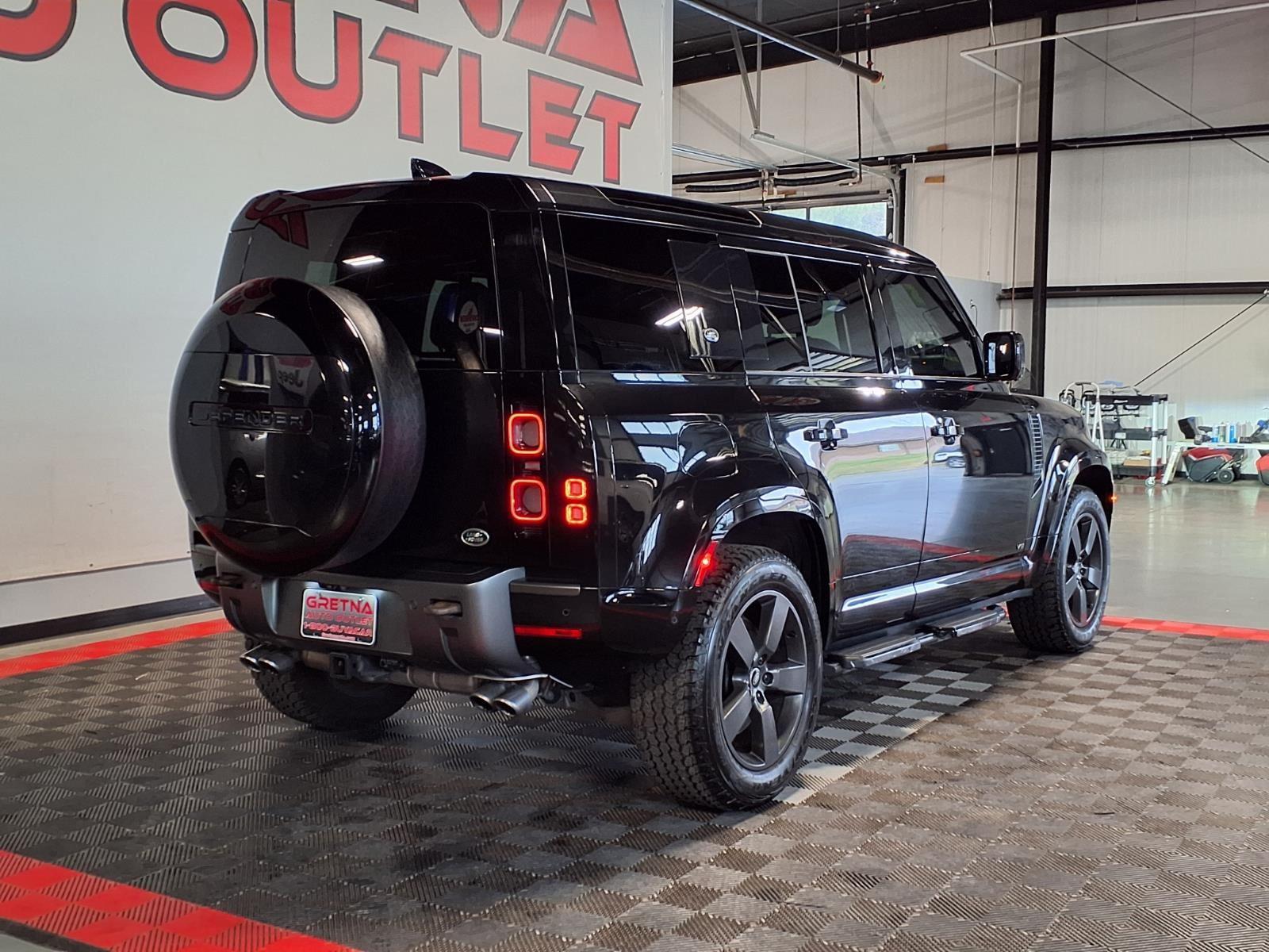 2023 Land Rover Defender V8 - Santorini Black Metallic exterior view 6